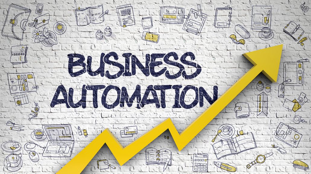 A yellow arrow pointing upwards on a brick wall. The text "Business Automation" is written above the arrow.