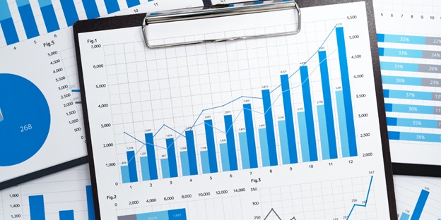 growth charts and financial reports for analysis